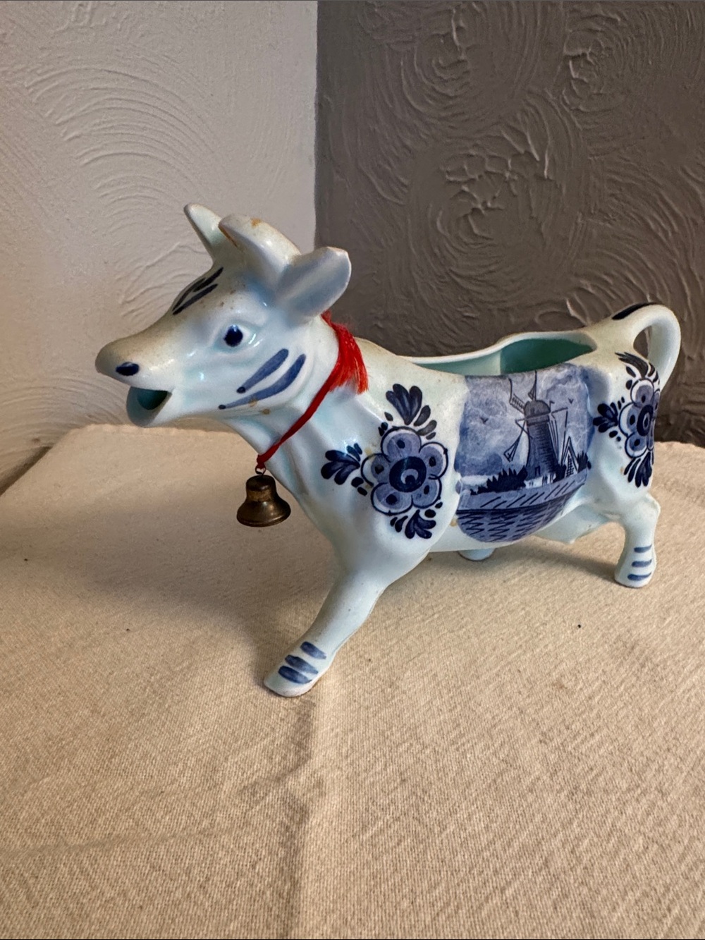 Blue and White Delft-Style Ceramic Cow Creamer with Red Collar and Bell